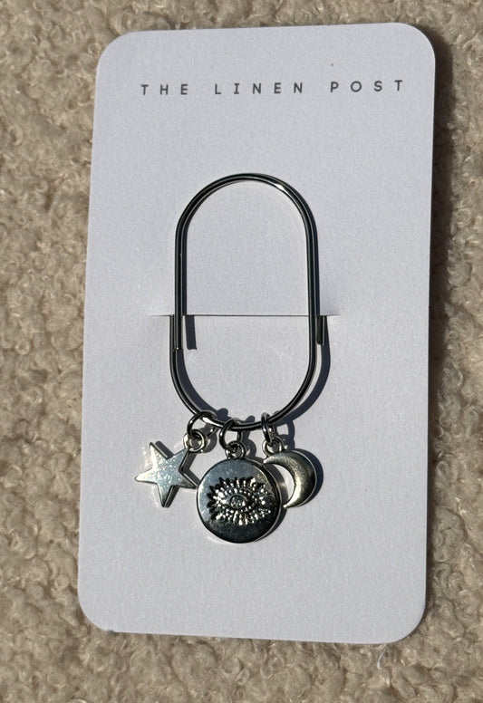 Evil Eye Coin Star & Moon Planner Clip in silver on a The Linen Post card