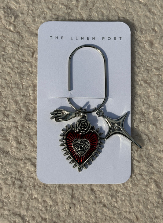 Red Sacred Heart & Star Planner Clip in silver on a The Linen Post card