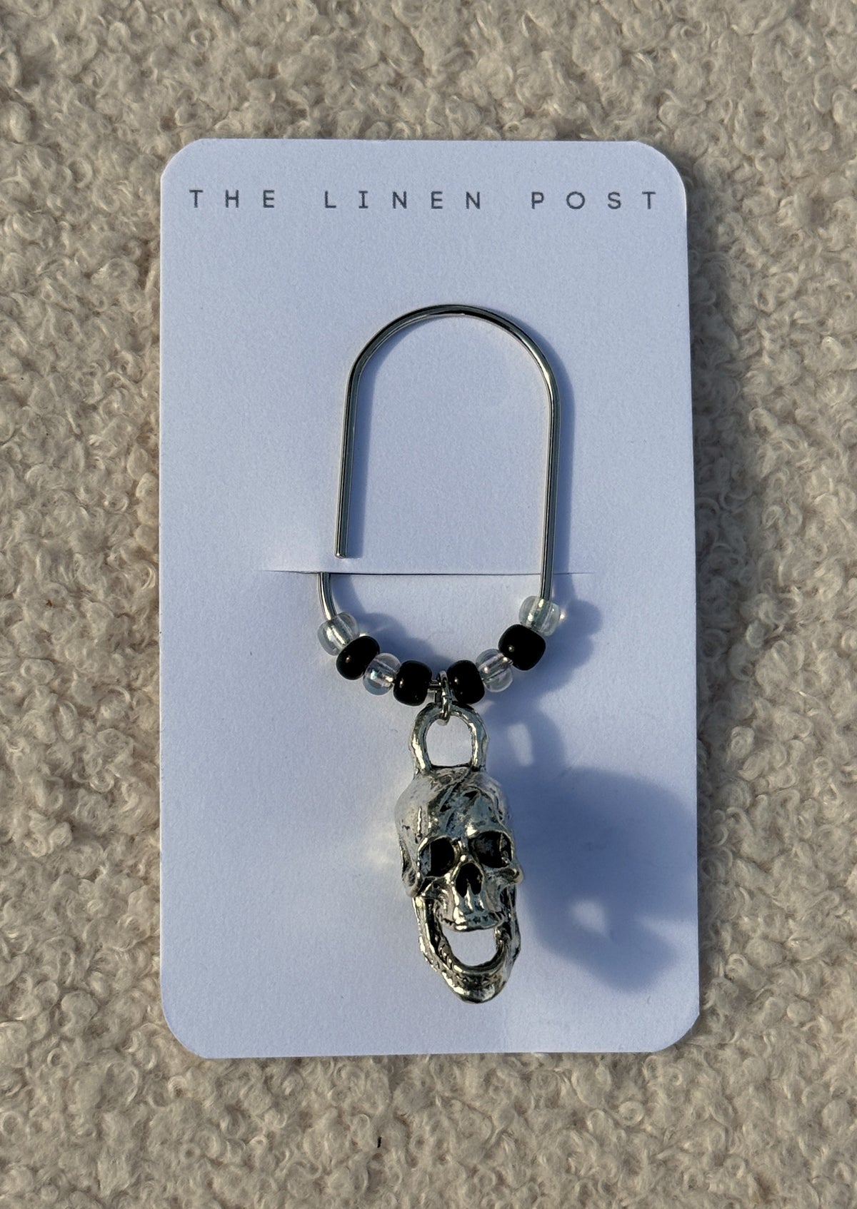 Silver Skull & Black Bead Planner Clip on a The Linen Post card