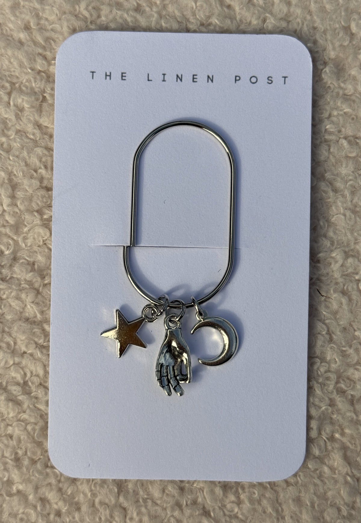 Star Hand & Moon Planner Clip in silver on a The Linen Post card