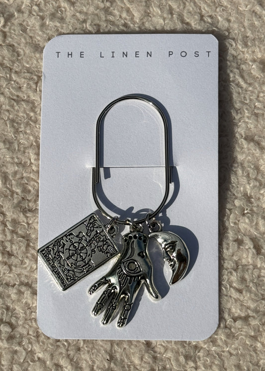 Tarot Hand & Moon Planner Clip in silver on a The Linen Post card