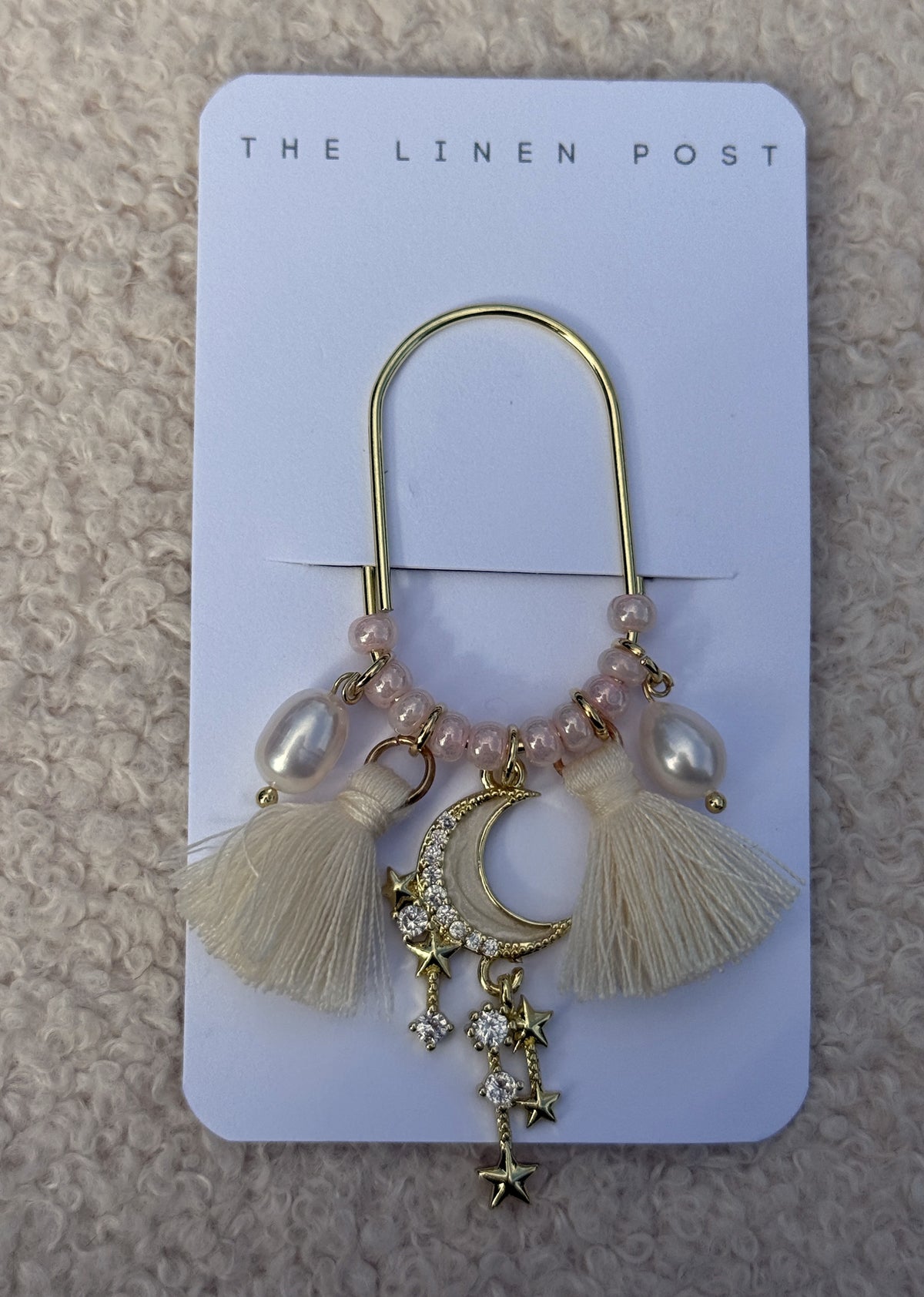 Tassel Moon & Star Planner Clip in gold on a The Linen Post card